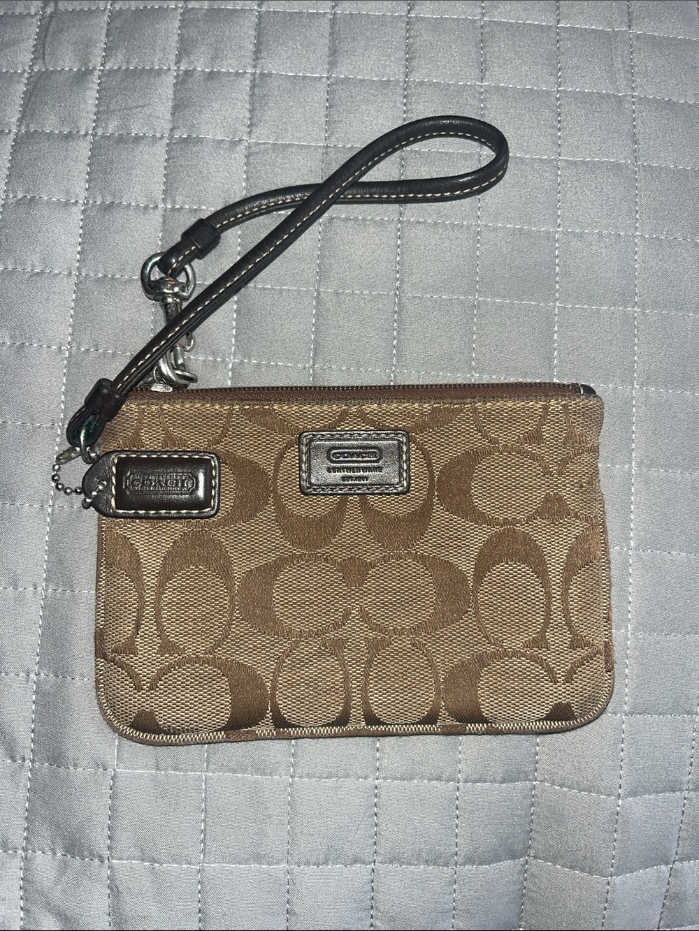 Coach Signature C Wristlet in Tan and Dark Brown